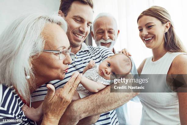 newest addition to our family - grandmother grandfather stock pictures, royalty-free photos & images