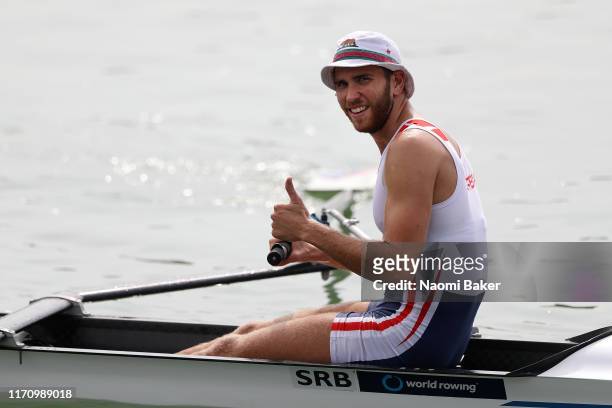 Martin Mackovic of Serbia celebrates towards the camera after the Men's Pair race during Day Four of the 2019 World Rowing Championships on August...