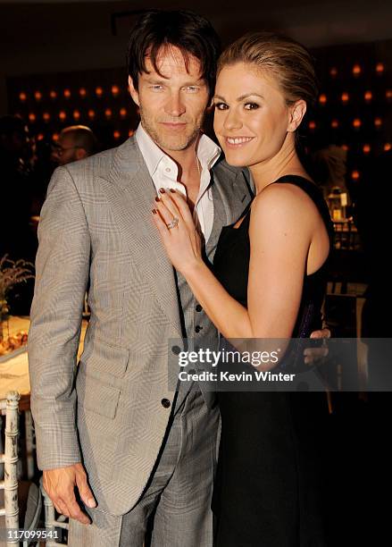 Actors Stephen Moyer and Anna Paquin pose at the after party for the premiere of HBO's "True Blood" at Social on June 21, 2011 in Los Angeles,...