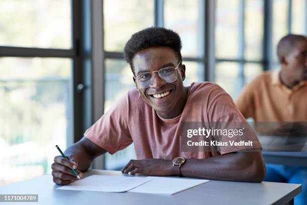 Students Using Paper 9,560 Student Holding Paper Stock Photos, High-Res Pictures, and Images ...