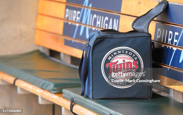 Detailed view of a Minnesota Twins equipment bag sitting in the dugout prior to the game against the Detroit Tigers at Comerica Park on September 24,...