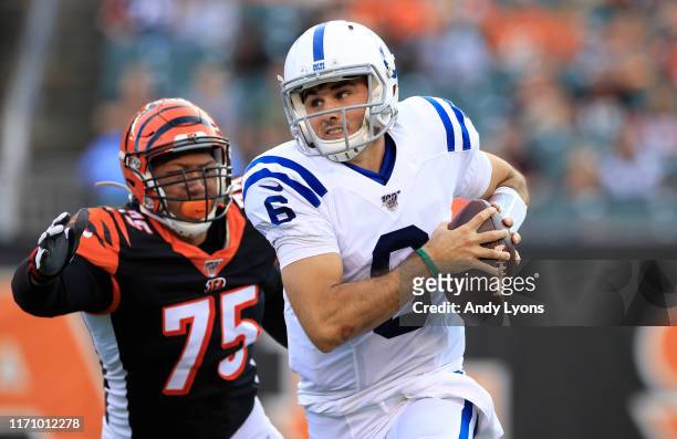 Chad Kelly of the Indianapolis Colts runs with the ball during the game against the Cincinnati Bengals at Paul Brown Stadium on August 29, 2019 in...