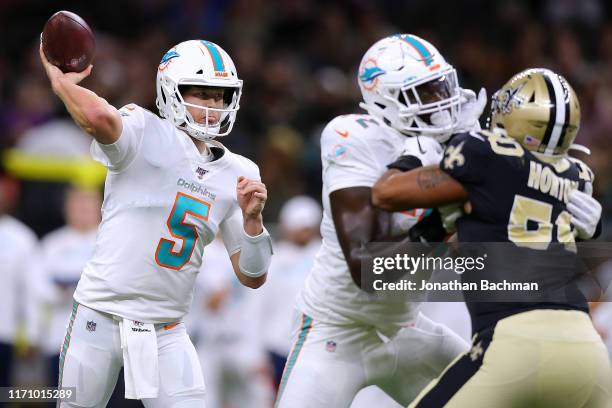 Jake Rudock of the Miami Dolphins passes during the first half of an NFL preseason game against the New Orleans Saints at the Mercedes Benz Superdome...