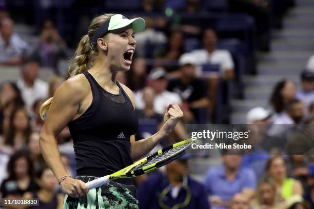 Caroline Wozniacki of Denmark celebrates victory during her Women's Singles second round match against Danielle Collins of the United States on day...