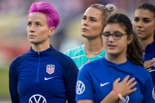 Megan Rapinoe of United States of the U.S. Women's 2019 FIFA World Cup Championship team stands with her hands to her side during the playing of the...