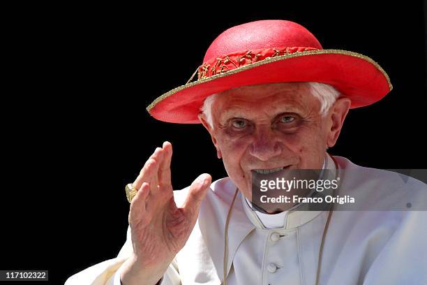 Pope Benedict XVI smiles to the faithful gathered in St. Peter's Square, at the end of his weekly audience on June 22, 2011 in Vatican City, Vatican....