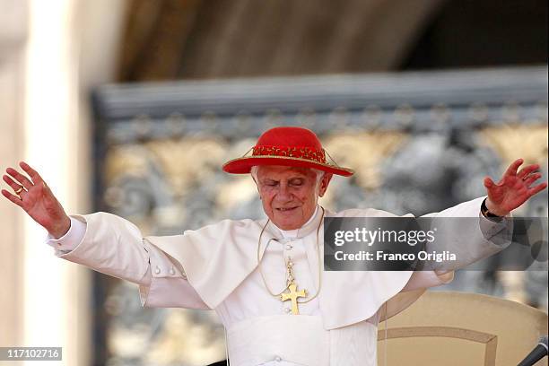 Pope Benedict XVI waves to the faithful gathered in St. Peter's Square, during his weekly audience on June 22, 2011 in Vatican City, Vatican.The...