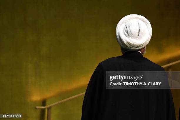 Iranian President Hassan Rouhani attends the 74th Session of the General Assembly at the United Nations headquarters in New York on September 25,...