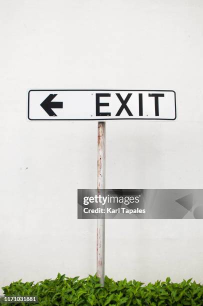 exit sign on a white background - exit sign stock pictures, royalty-free photos & images