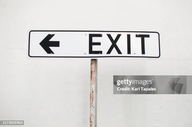 exit sign on a white background - exit sign white background stock pictures, royalty-free photos & images