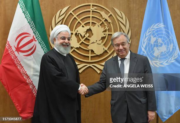 President of Iran Hassan Rouhani meets with United Nations Secretary-General Antonio Guterres at the United Nations in New York on September 25, 2019.
