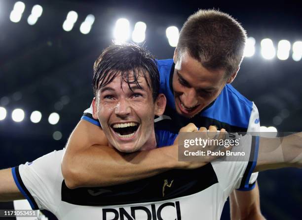 Marten De Roon with his teammate Mario Pasalic of Atalanta BC celebrates after scoring the team's second goal during the Serie A match between AS...