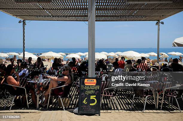 Sign shows the price in Euros for a breakfast menu in a restaurant on the La Barceloneta beach on June 22, 2011 in Barcelona, Spain. Eurozone finance...