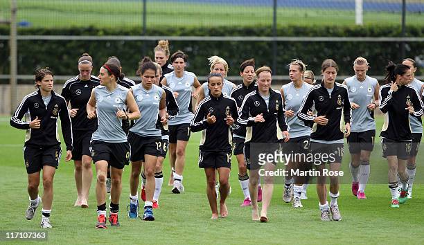 The team of Germany runs during the Germany Women national team training session at Wurfplatz stadium on June 22, 2011 in Berlin, Germany.