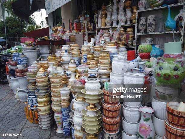 buddhism spirit objects for sale on  danang,vietnam - funeral merchandise stock pictures, royalty-free photos & images