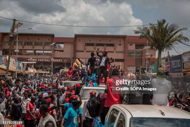 Bobi Wine, aka Robert Kyagulanyi, is being driven through the streets while campaigning in Hoima. Wine aka Robert Kyagulanyi, campaigned in Hoima...