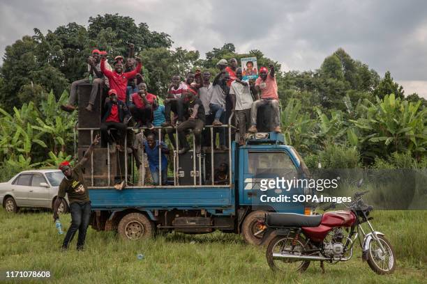 Supporters of Bobi Wine and the "people power" opposition movement seen during a rally in Hoima. Wine aka Robert Kyagulanyi, campaigned in Hoima...