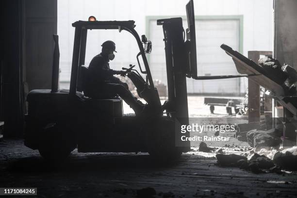 forklift crashed inside factory - forklift truck stock pictures, royalty-free photos & images