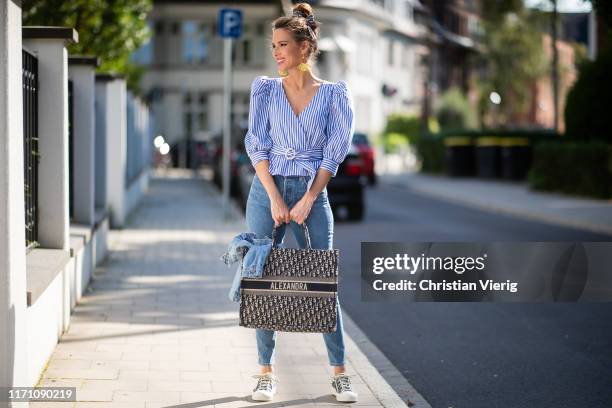 Alexandra Lapp is seen wearing a blue Dior Book Tote Dior Oblique, News  Photo - Getty Images