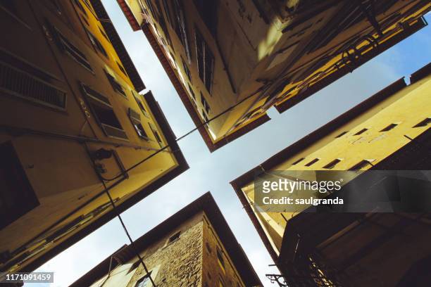 low angle view of buildings in the old town of florence - cross shape stock pictures, royalty-free photos & images