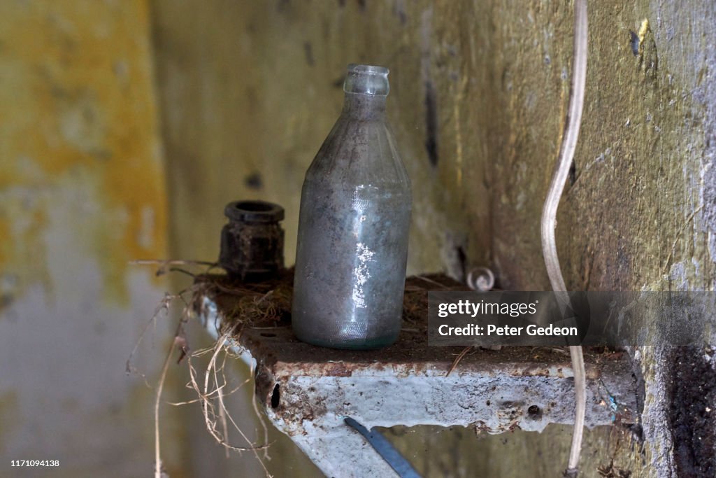 Abandoned secret soviet military base - bottle on a shelf