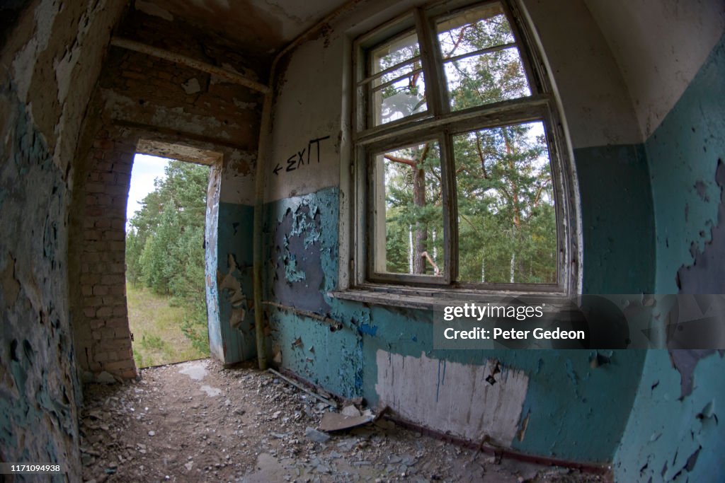 Abandoned secret soviet military base - Distressed Room with a window