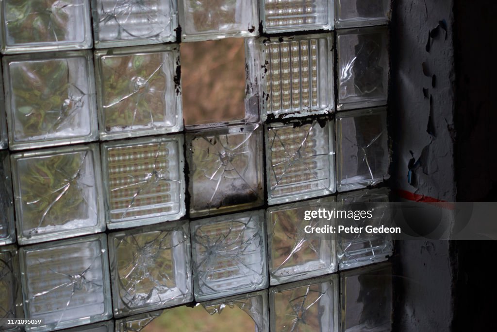 Abandoned secret soviet military base - broken glass blocks / tiles