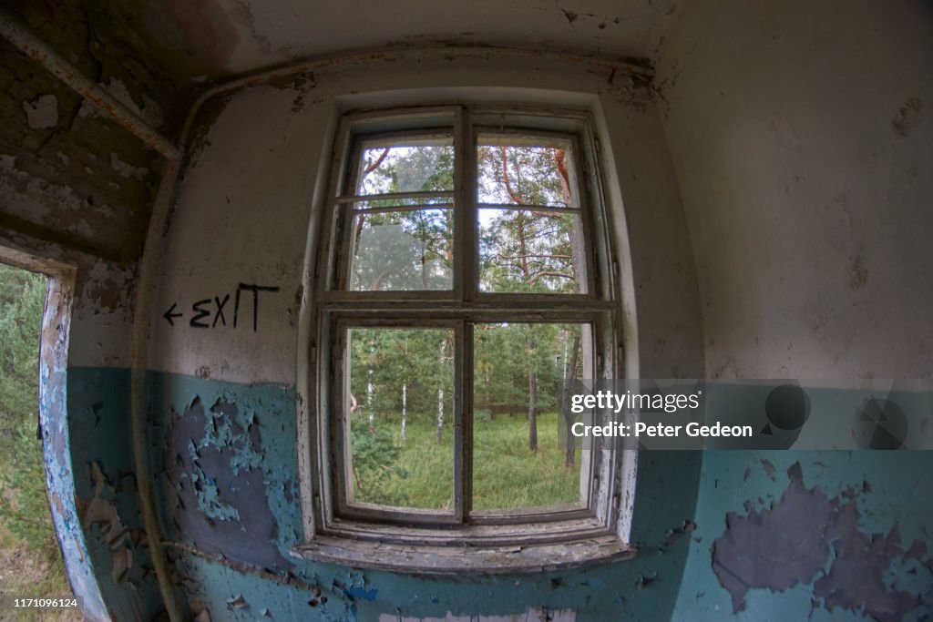 Abandoned secret soviet military base - Distressed Room with a window