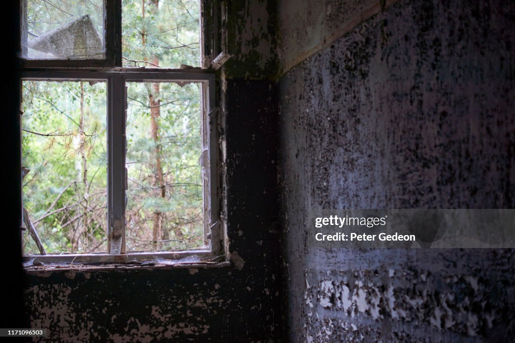 Abandoned secret soviet military base - Distressed Room with a window