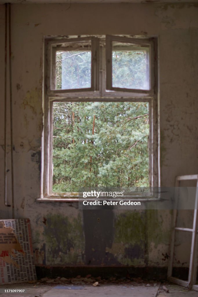 Abandoned secret soviet military base - Distressed Room with a window