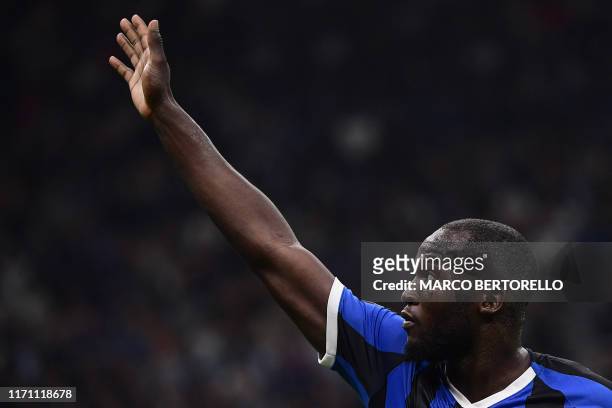 Inter Milan's Belgian forward Romelu Lukaku acknowledges the public as he leaves the pitch for substitution during the Italian Serie A football match...