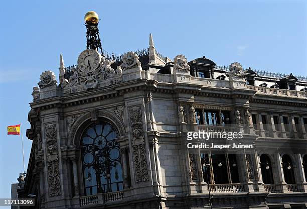 Spanish flag flies on top of the national central Bank of Spain on June 22, 2011 in Madrid, Spain. Eurozone finance ministers are currently seeking...