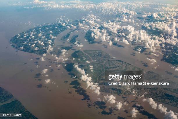 bay of bengal and hatiya island in bangladesh daytime aerial view from airplane - bangladesh aerial stock pictures, royalty-free photos & images