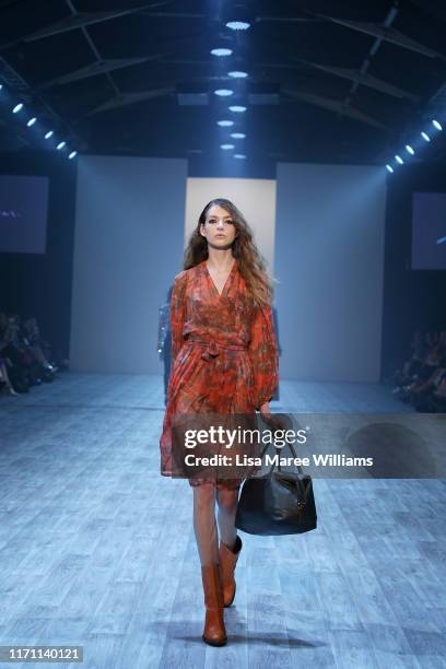 Model walks the runway during the Zambesi: 40 Years of Fashion show during New Zealand Fashion Weekend 2019 on August 30, 2019 in Auckland, New...