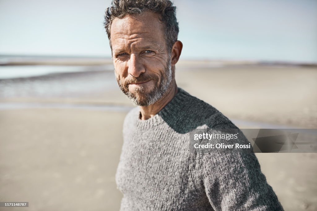 Portrait of confident man on the beach