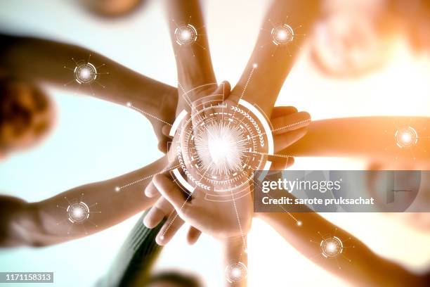 young group are join hands for working the job success , hands, symbolizing the hands to unity and line connection for teamwork ,success ,helps , business concept. - friendly match stockfoto's en -beelden