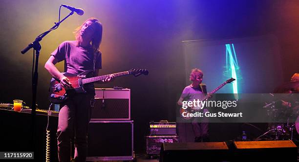 Kevin Parker and Nick Allbrook of the band Tame Impala perform on stage at The Roundhouse on June 22, 2011 in London, England.