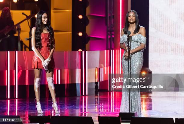 Model Winnie Harlow and singer-songwriter and Rock Star Award recipient Ciara speak on stage during the 2019 Black Girls Rock! at NJ Performing Arts...
