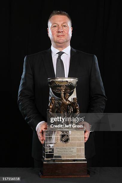 General Manager Mike Gillis of the Vancouver Canucks poses after winning the NHL General Manager of the Year Award during the 2011 NHL Awards at The...