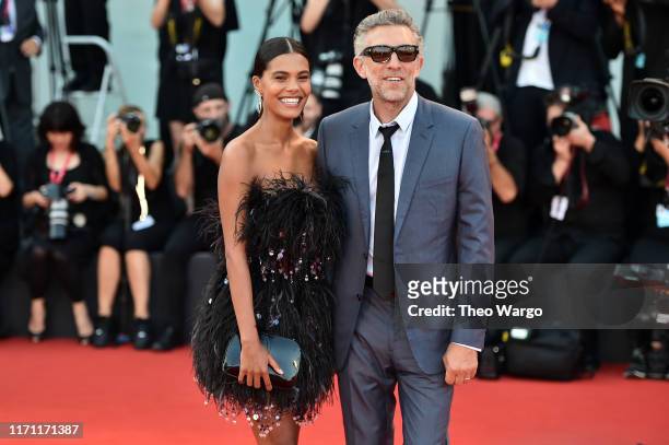 Tina Kunakey and Vincent Cassel walk the red carpet ahead of the "J'Accuse" screening during the 76th Venice Film Festival at Sala Grande on August...