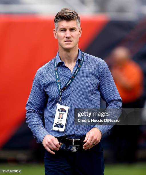 General manager Ryan Pace of the Chicago Bears walks on the sidelines prior to the preseason game against the Tennessee Titans at Soldier Field on...