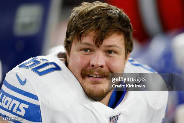 Graham Glasgow of the Detroit Lions sits on the bench during a preseason game against the Cleveland Browns at FirstEnergy Stadium on August 29, 2019...