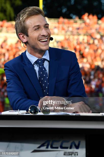 Analyst Jac Collinsworth laughs on the field-level set of the ACC Network's presentation prior to the Clemson Tigers' football game against the...