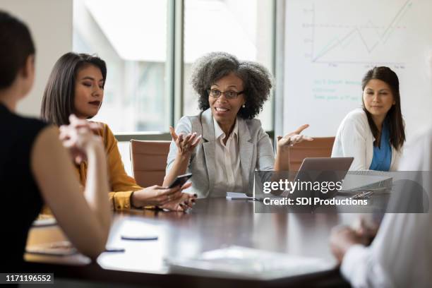 board of directors making decisions - boardmember stock pictures, royalty-free photos & images