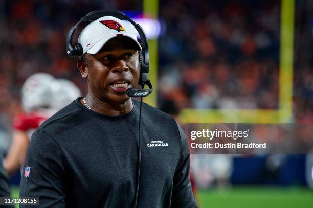 Offensive Coordinator Vance Joseph of the Arizona Cardinals works on the sideline in the third quarter of a game against the Denver Broncos during a...