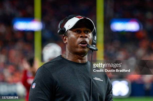 Offensive Coordinator Vance Joseph of the Arizona Cardinals works on the sideline in the third quarter of a game against the Denver Broncos during a...