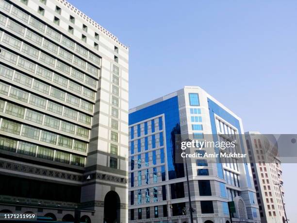 skyscraper buildings - medina district stock pictures, royalty-free photos & images