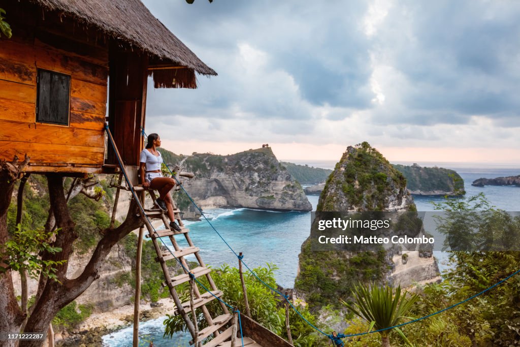 Woman at treehouse, Nusa Penida, Bali, Indonesia
