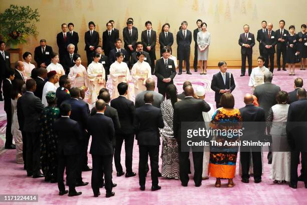 Emperor Naruhito addresses while Empress Masako and royal family members listen at the tea party inviting African leaders at the Imperial Palace on...