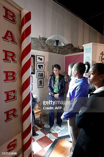First lady Michelle Obama visits the District Six museum, in Cape Town, South Africa, on June 23, 2011 with hers daughter Malia Obama , niece Leslie...